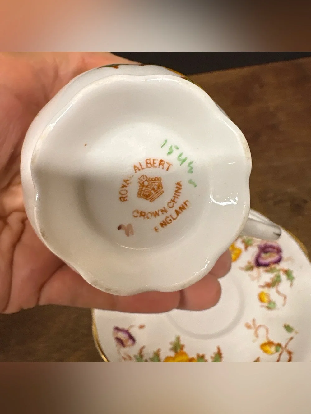 Royal Albert White Teacup and Saucer with Orange, Yellow, Pink Floral Design